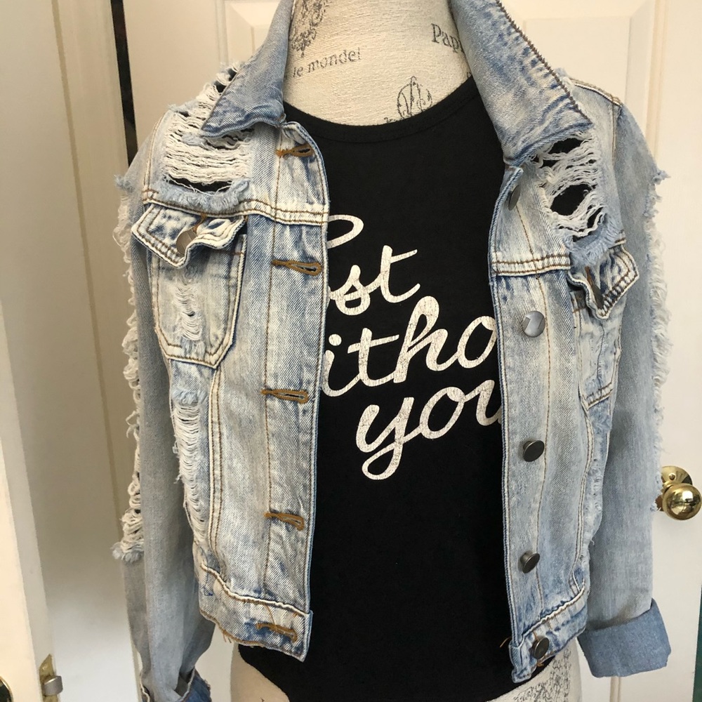 Distressed jean jacket